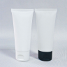 plastic cosmetic tube with multiple cap options